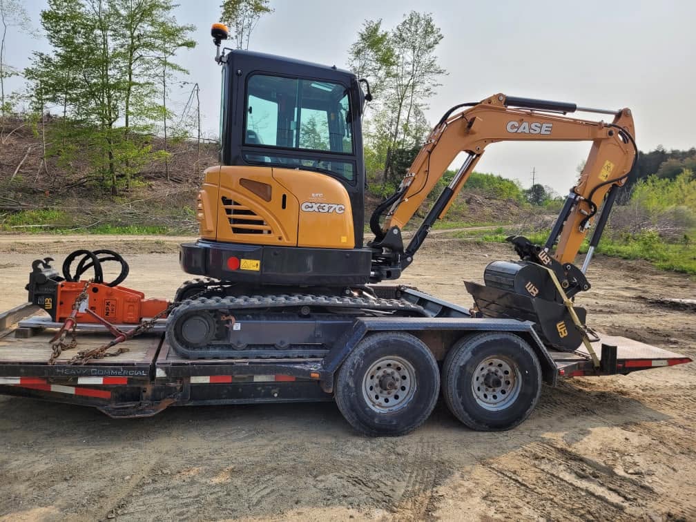 Husky Enterprises excavator prepared for site work