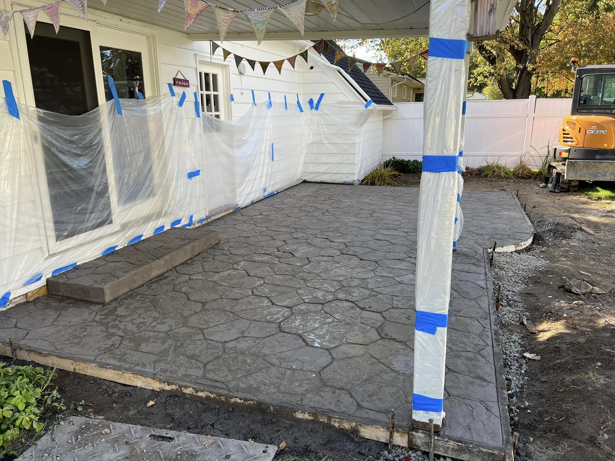 Stamped concrete patio installed by Husky Enterprises in the Lakewood, NY area